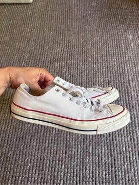 “Chuck Taylor” Converse White Low-Top Canvas Sneakers with Red Accent